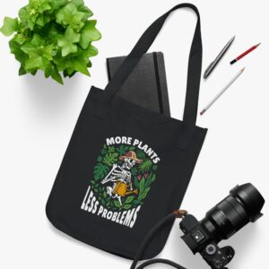 Organic canvas plant lover tote bag with a skeleton watering plants illustration and the text "More Plants, Less Problems.